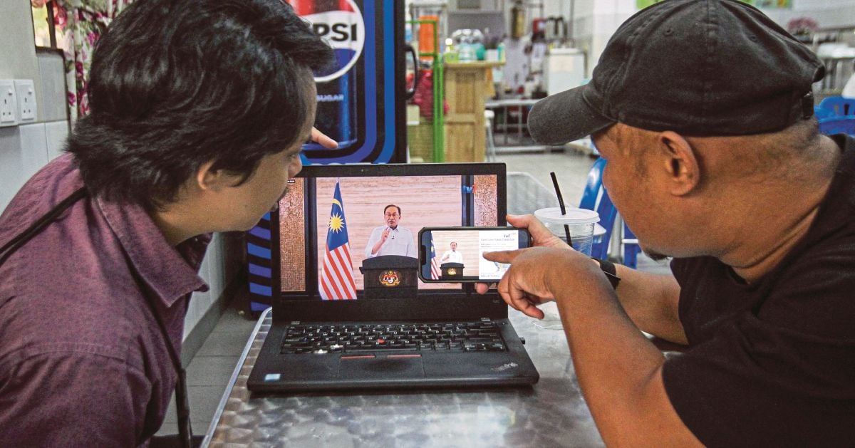 Cash, cheaper fuel and toll hike freeze: Here's what Malaysians are getting from govt relief