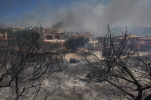 Greece battles wildfires across country, evacuates villages