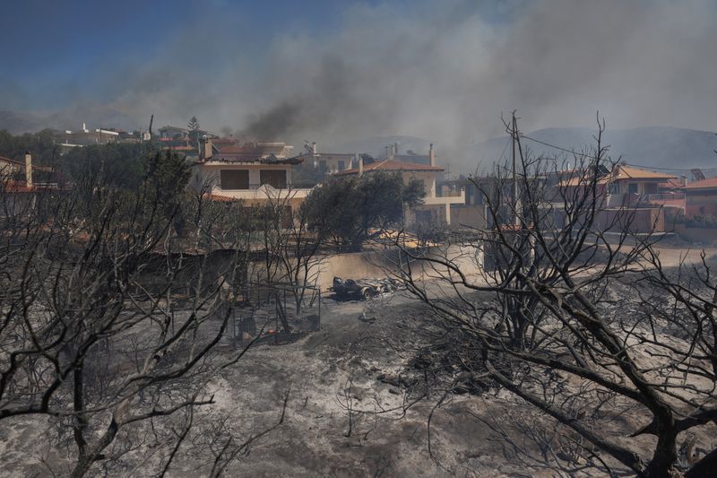Greece battles wildfires across country, evacuates villages