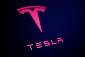 Tesla says it started building initial versions of an affordable car