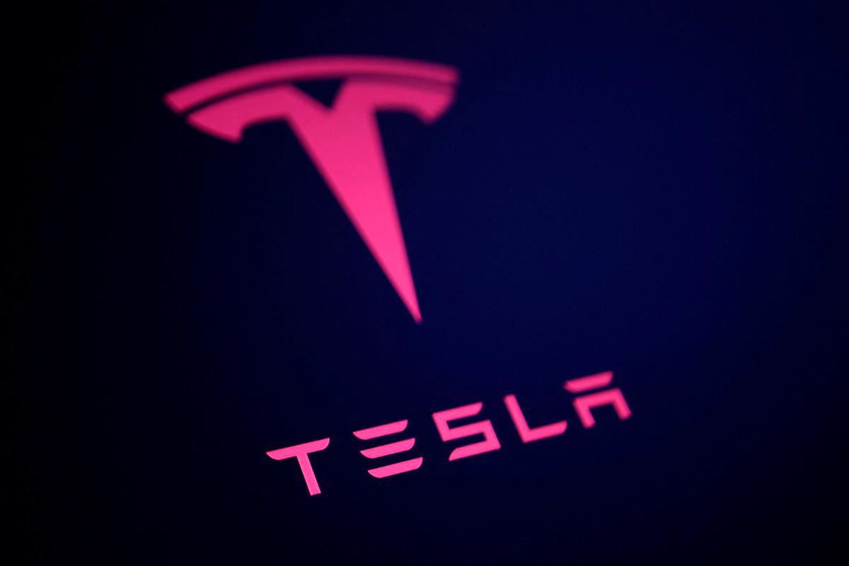Tesla says it started building initial versions of an affordable car