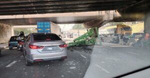 Two injured as trailer cargo hits flyover beam