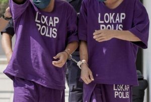 Two rally-goers arrested for allegedly 'whipping' effigy of PM