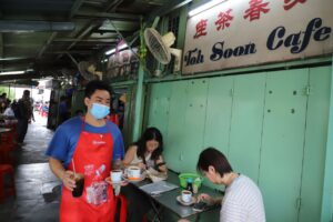 75-year-old Penang kopitiam draws tourist queues