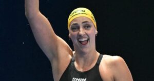 Australia's beaming Harris foils Walsh treble bid at swimming worlds