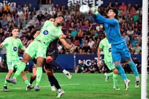 Barcelona complete late comeback win as Atletico drop Liga points