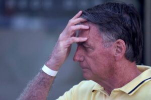 Brazilian judge boosts police patrols at Bolsonaro’s home over flight risk