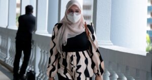 Civil servant claims trial to gold bracelet bribery charge