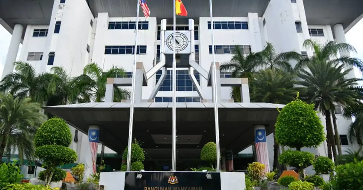 Ex-teacher charged with making false statement about PM
