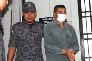 Farmer charged with trafficking six Indonesians into country