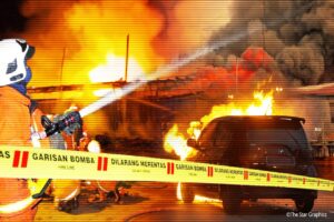 Firefighters battling bushfire in Port Klang