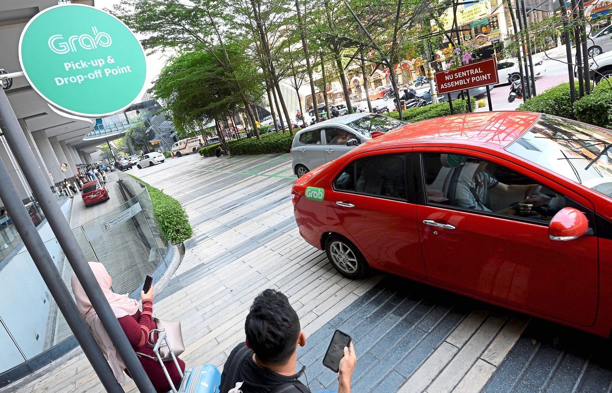 Grab fares topping S$1,000 stun Singapore ride-hailing users