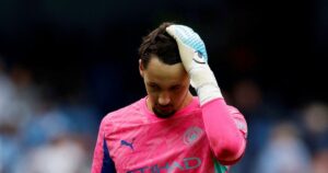 Guardiola defends Trafford after costly error against Spurs