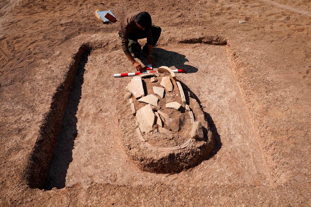 Iraq drought uncovers 40 ancient tombs in Mosul Dam reservoir
