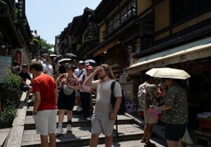 Japan should debate cap for foreign residents, government report says