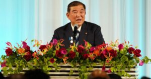 Japan's Ishiba bounces back in polls, defies calls to quit