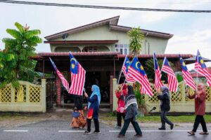 Kelantan man gives 15,000 free Jalur Gemilang flags for National Day
