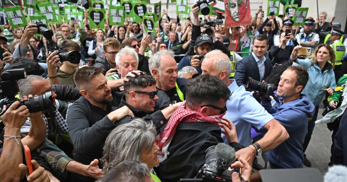 Kneecap rapper faces court on terror charge over Hizbollah flag