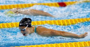 McIntosh and Marchand dazzle for gold at world championships