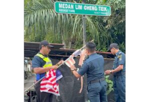 Penang Island City Council enforcement officers praised for assisting with flag displays