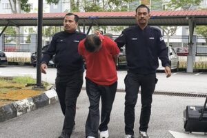 Penyelia tapak didakwa pindah wang haram RM2 juta