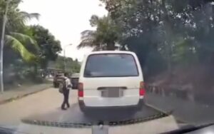 QuickCheck: Was a school van driver dropping off children from a moving vehicle?