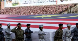 Sea of patriotism as 68th National Day parade begins