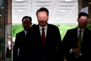South Korea’s ex-leader Yoon refuses questioning, lies on cell floor