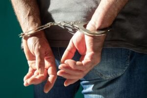 Two held over seditious and threatening social media posts