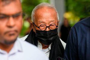 Tycoon who brought F1 to Singapore pleads guilty in graft case