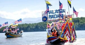 135 boats show the flag in Malaysia Day river parade