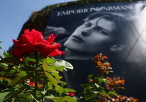 A lone red rose outside Armani as Milan mourns its 'king' of fashion