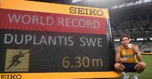 Duplantis sets new pole vault record as retains world title