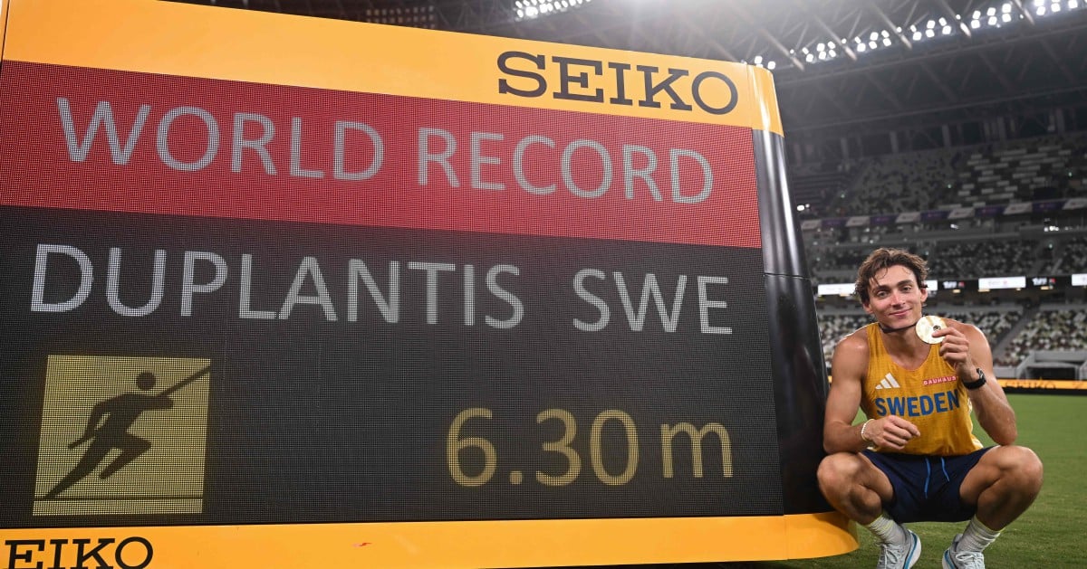 Duplantis sets new pole vault record as retains world title