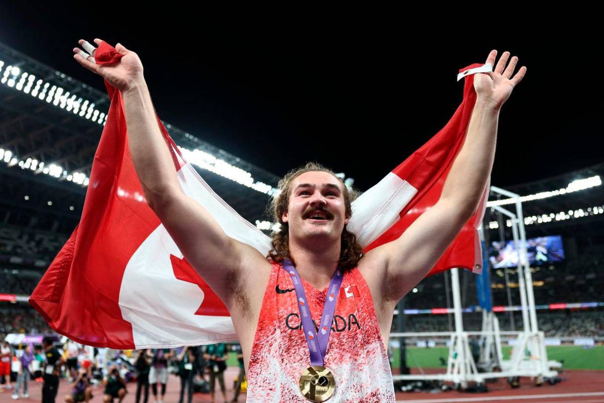 Ethan Katzberg wins world hammer title with record 84.70m throw