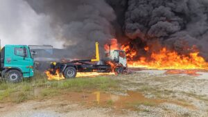 Four lorries razed by fire near Seremban