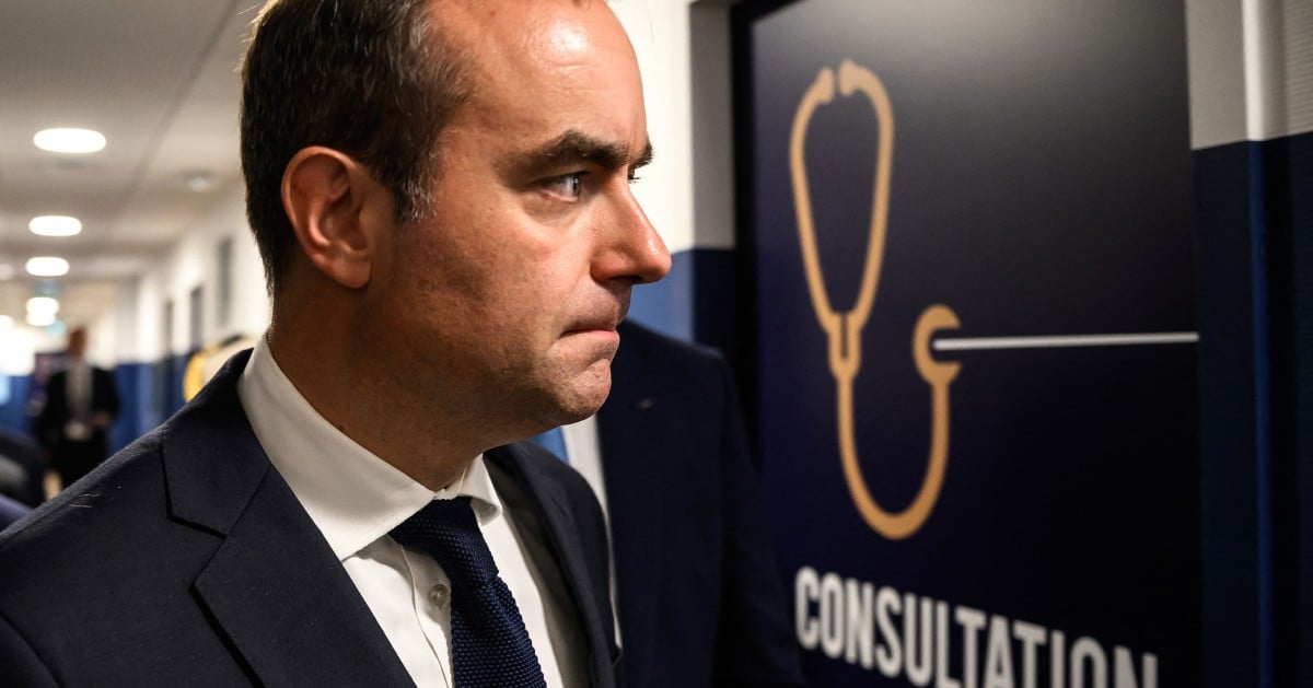 France's new PM courts the left a day after ratings downgrade