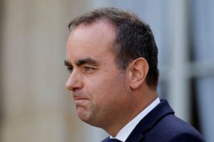 French Socialists press Macron's new government for major budget concessions
