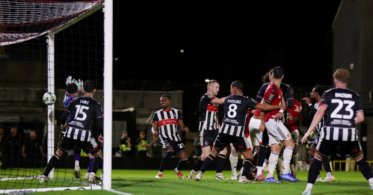 Grimsby fined for player registration error after Man Utd victory