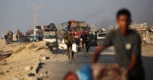 Israeli military urges Gaza City residents to leave, bombs high-rise tower