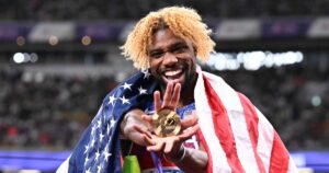 Lyles emulates Bolt with fourth world 200m title
