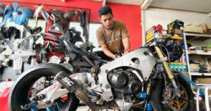 Malaysia's Mowgli shifts gears, from herding buffaloes to fixing bikes