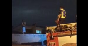 Man arrested after nearly four-hour rooftop drama