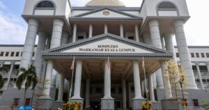 Man, ex-wife face multiple charges over RM215,000 unit trust scam