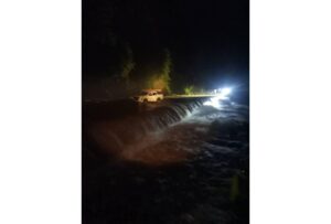 One missing, two escape after floodwaters sweep utility workers in Keningau