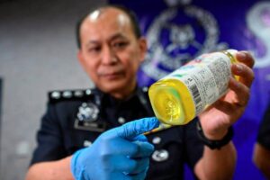 Police detain two men distributing drug-infused herbal drinks in KL