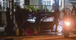 Police hunting woman's ex-husband after double stabbing deaths