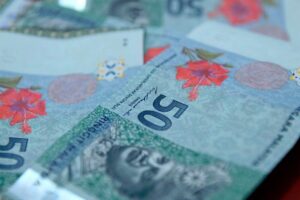 Ringgit opens lower vs greenback amid US interest rate cut