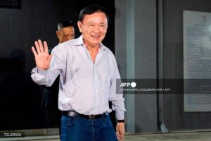 Thai ex-PM Thaksin leaves country before crucial leadership vote