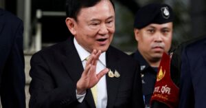 Thailand's influential ex-premier Thaksin Shinawatra leaves country amid turmoil